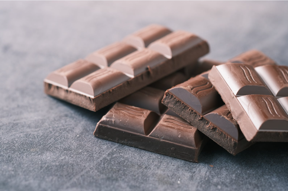 Unwrapped chocolate bars on counter